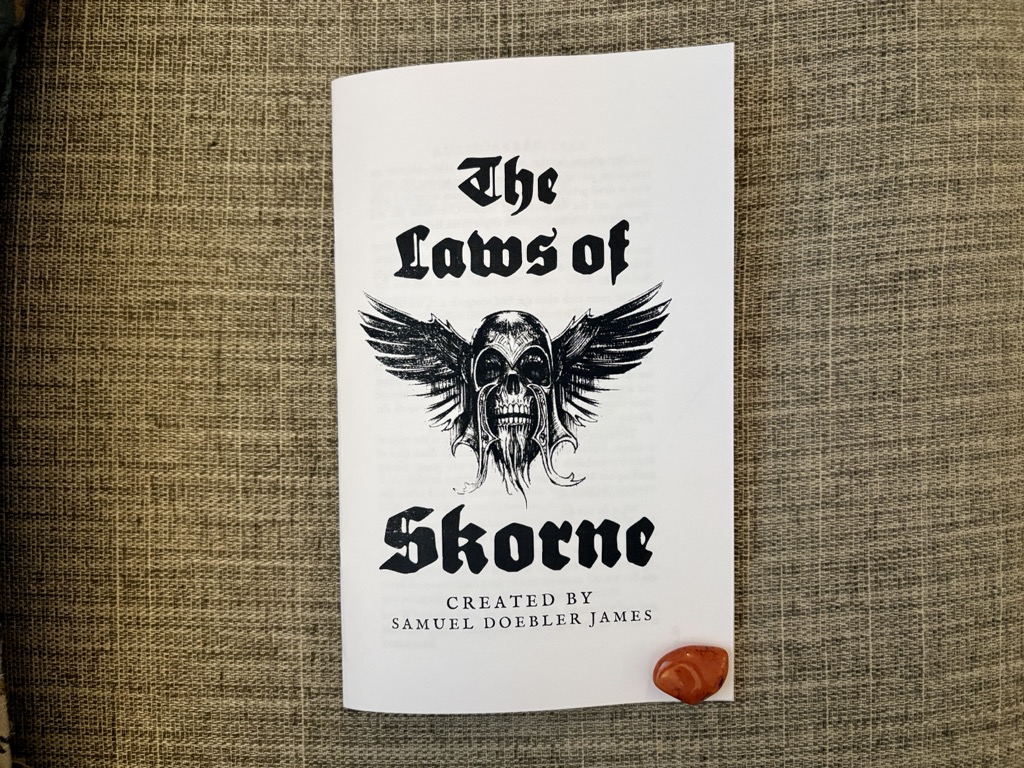 Skorne booklet on my sofa